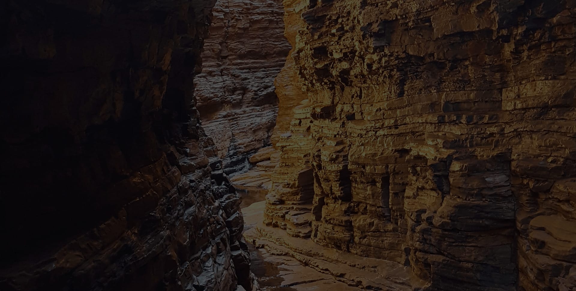 Shadowed canyon with layered rocks